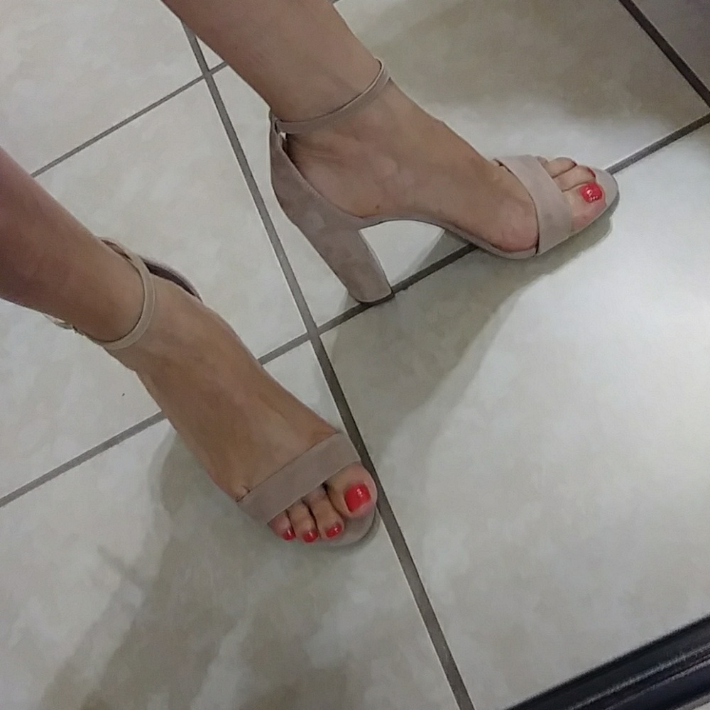 Vince Camuto nude suede heels.